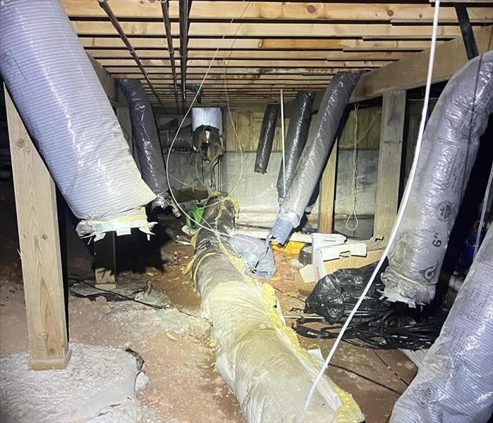 Crawlspace HVAC system that has been affected by water intrustion
